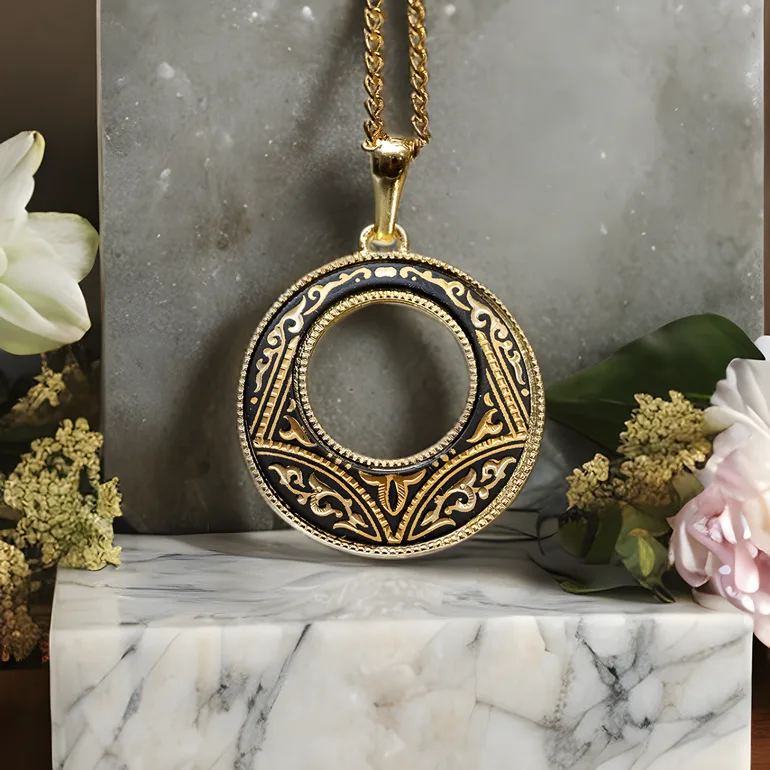 Кулон Eternity від Anframa: дамаська сталь з позолотою