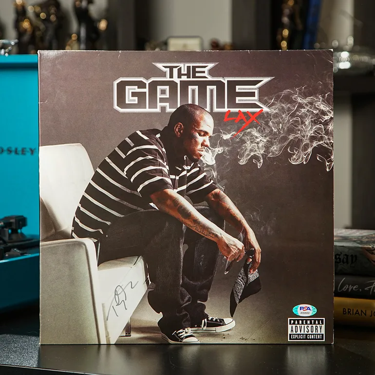 Автограф The Game на вініловій платівці альбому L.A.X. (2008)